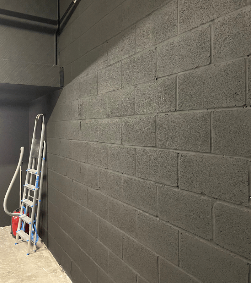 Bristles of Bristol commercial black wall painting Bristles of Bristol commercial black wall painting